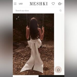 MEREDITH Strapless Bow Mini Dress for brides 
Mini white bow Meshki dress.